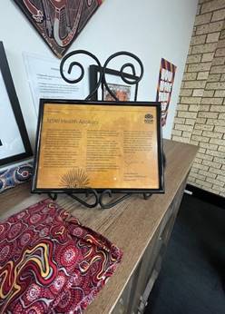 A sign on a table

Description automatically generated