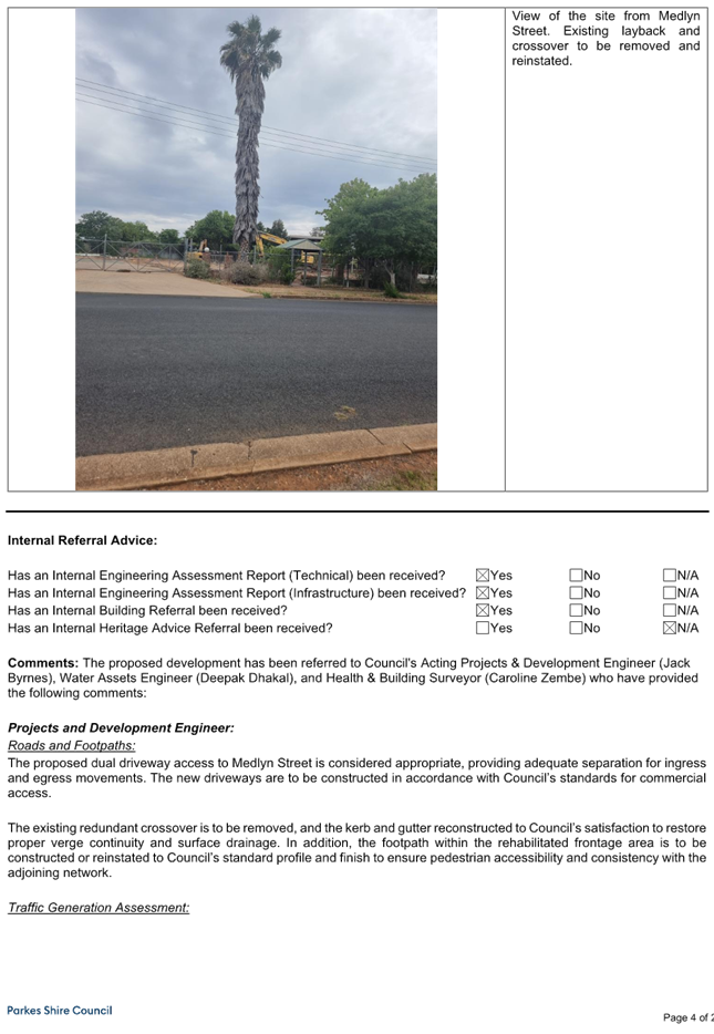 A telephone pole in the middle of a road

AI-generated content may be incorrect.